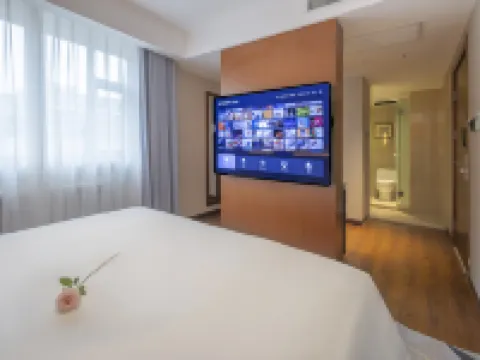 Romantic Season Middle Street Hotel (Shenyang Zhongjie Palace Museum Joy City Store) Hoteles en Shenyang