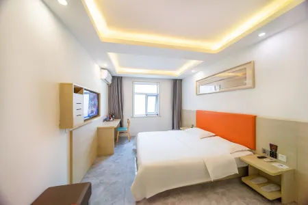 Xixi Huajiantang Hotel (Xiongxian Bus Station) Отели рядом с достопримечательностью «Songliao Bianguan Gu Tunnel»