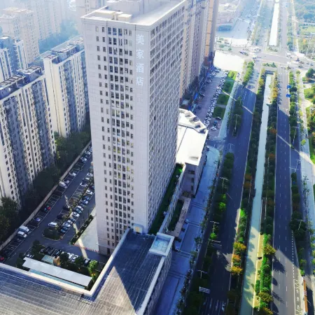 Meijia Hotel (Langxi Guogou Plaza) Отели в г. Ланси