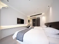 Xidu International Hotel 이우 정보 광전학원 주변 호텔