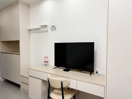 Chuanmei International Apartment (Chengdu Jingrong Lake Century Science Fiction Park Branch Отели рядом с достопримечательностью «Lujiatan Ferry»