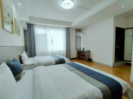 Luodian Rongzhuang Homestay Отели в г. Лодян