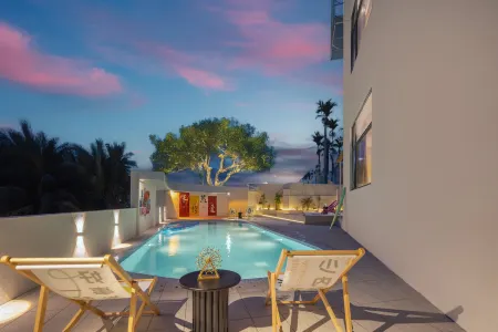 EHOUSE Guixia Yunqi Hidden Mountain Homestay (Wanning Shimei Bay Roundabout Tourist Highway Store) Отели рядом с достопримечательностью «Huarun Shimeiwan Beach»