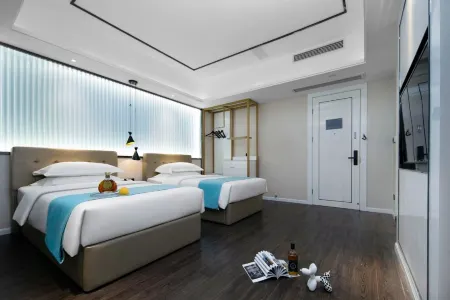 Elong ME Hotel (Wuhan University of Technology Mafangshan Subway Station) Отели рядом с достопримечательностью «Hubei Business College»