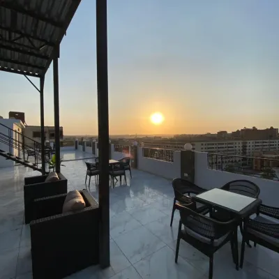 Families Inn Pyramids - Rooftop Отели рядом с достопримечательностью «Гиза»