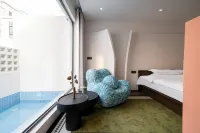 Floral Hotel·Hong Designer High-End Vacation Villa (Beihai Silver Beach Branch) - avec sources thermales