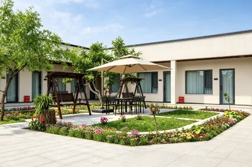 新源軒培居|Warm Lodge·庭院休閒民宿（新源客運站店）