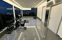 Huanman Qiancheng Elite · Aesthetic Luxury Hotel (Huaguoyuan White‑House Art Center, Guiyang) - Phòng Gym
