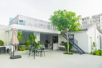 Pinyueju Homestay (Beihai Silver Beach Qiaogang Fengqing Street Branch) Hotels near Sunny Beach