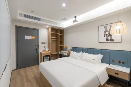 Yunhe Zhenpin Hotel (Ergong Gymnasium Finance and Economics University Store) Отели рядом с достопримечательностью «Urumqi Railway Transport School (Beijing Middle Road)»