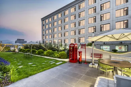 Weiran esports hotel Отели рядом с достопримечательностью «Taizhou University (Linhai Campus)»