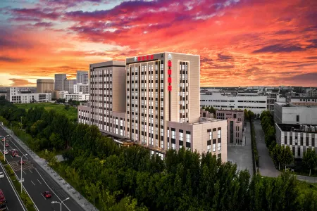 Mayjoys Hotel Отели рядом с достопримечательностью «Tianjin Occupation Skill Public Training Center Gymnasium»