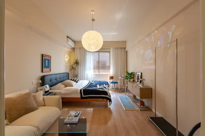 Qianshi Apartment (Shanghai Yuyuan Subway Station Branch) โรงแรมในพื้นที่สวนหยู