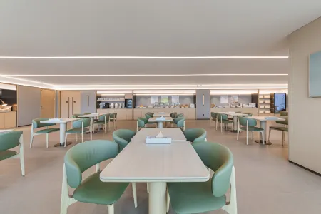 QuanJI Jiyuan Baolong Plaza Hotel Отели рядом с достопримечательностью «Huanghe Institute of Technology»