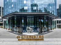 Jingkai Mingzhen International Hotel Отели рядом с достопримечательностью «Школьный округ Тай Чэньлунг, Сычуань-Академия Танцов»