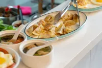 Magnotel Magnolia Hotel (Jiamusi Railway Station New Mart) - sarapan