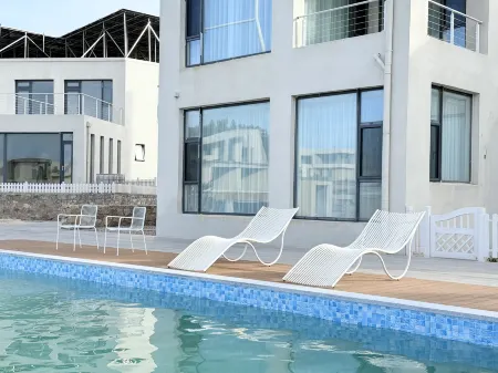 Yuhai Xiangyue Homestay Отели в г. Жунчэн