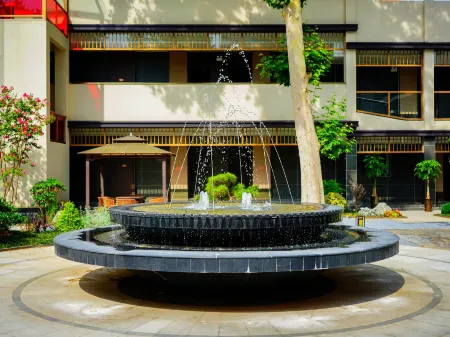 Renjoy Hotel (Luoyang Xiaojie Tianfu Railway Station) Отели рядом с достопримечательностью «Zhouwangcheng Square»