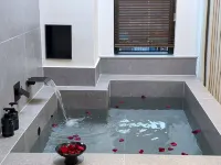โฮมสเตย์มู่หยุน บ่อน้ำพุร้อนส่วนตัว - โรแมนติก