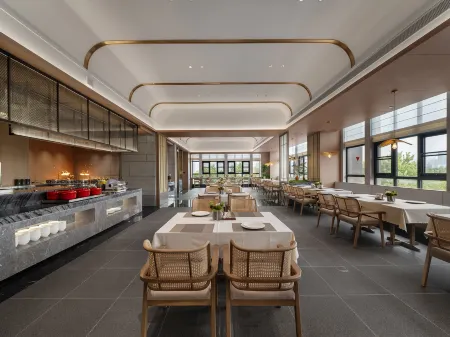 Xihe Hotel (Pangdonglai Angel City) Отели рядом с достопримечательностью «Qingyihe Thousand Acres Garden»