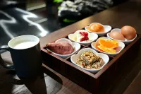 Fragrance Court Courtyard Homestay · Datong - petit déjeuner