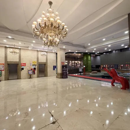 Mengdan International Hotel (Jiangmen Hetang Central Square Jinyi City Branch)