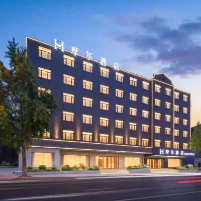 Moore Hotel (Dalian Fujiazhuang Beach Resort Branch) Отели рядом с достопримечательностью «Лаохутан Парк»
