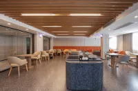 โรงแรมชิง หมู่ เพลทตินัม (ซูหนิงพลาซ่า เหยาโบ่น ฝูหยาง) - พร้อมอาหารเช้า