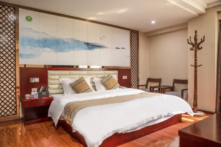 Lvchun Green East Business Hotel Отели в г. Lvchun