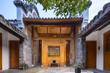 Zhongxiang Muxi hotel (Obvious Mausoleum Store in Mochou Village) Отели рядом с достопримечательностью «Xianling Mausoleum»