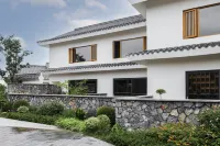 九思山房酒店（桃花山店） 鄰近遂寧喜盈門卡百利藝術塗料高定館的酒店