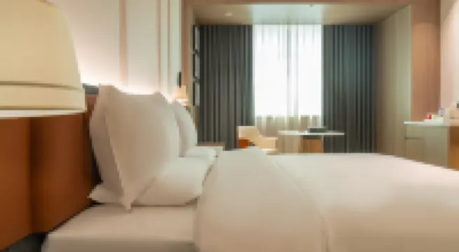 NEW BAO HUI · HAPPY SLEEP HOTEL