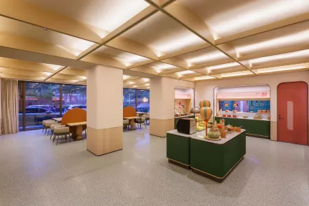 Orange Hotel (Wanda Plaza Branch in Dalian Development Zone) Отели рядом с достопримечательностью «Dalian Minzu University»