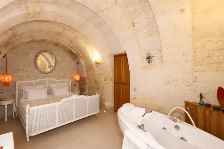 Anatelein Boutique Cave Hotel Отели в г. Tekelli Mahallesi