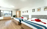Yijia Qingju Boutique Stay (Weihai International Coastal Baths Huoju 8th Street)
