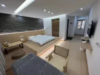 Stone Hot Spring Inn (Hot Spring Qidan Ancient Town) Hotels in Shidian