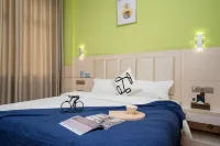 Youge Shangpin Hotel (Xinxing Times Square Bus Station)