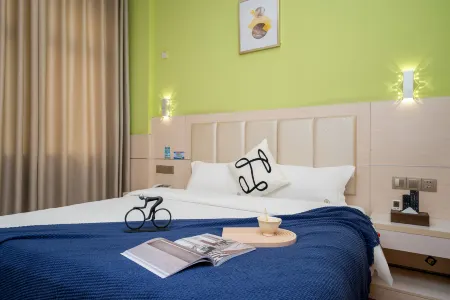 Youge Shangpin Hotel (Xinxing Times Square Bus Station)