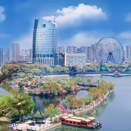 Wuxi Juna Hubin Hotel Отели в г. Уси