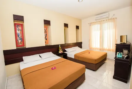 Hotel Puri Nusa Indah Отели рядом с достопримечательностью «Kampus FKIP UNMAS»