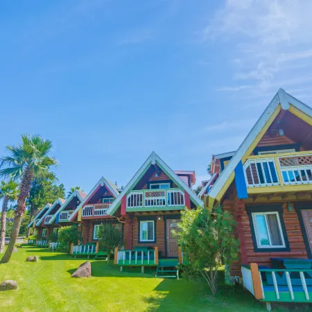 Jungmun Log Pension & Resort Отели рядом с достопримечательностью «Храм Попхваса»