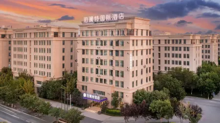 Bolante Hotel Отели в г. Уцзяцюй