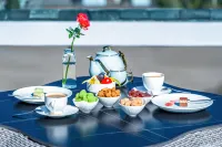 Star of Lijiang · Sun Shine Jinshan View Snow Mountain Panoramic Garden Hotel - servizio colazione
