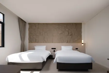 Qiyu Shihai Hotel Отели рядом с достопримечательностью «Nanwan Monkey Islet»