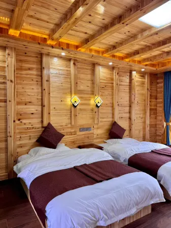 Mugui Kangba Homestay Отели рядом с достопримечательностью «Lotus Sea»