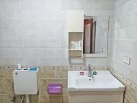 Nayong Qiandihong Hotel - Inns