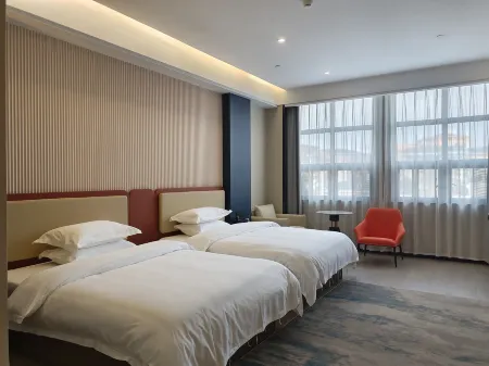 Yuanling Baiman Hotel (Junlin Tianxia) Отели рядом с достопримечательностью «Longxing Lecture Temple»