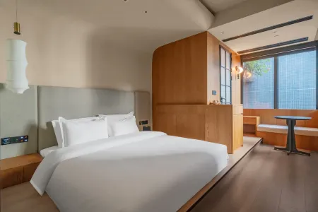 Lingnan Hotel (Guang'an Wuyue Plaza) Отели в г. Гуанан