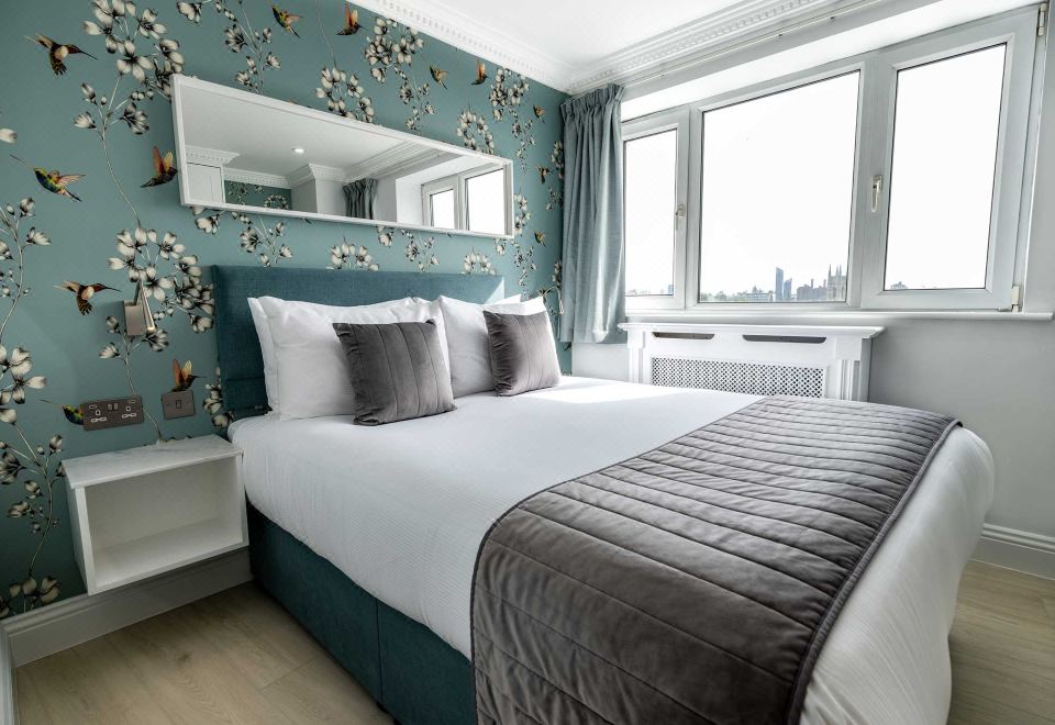 첼시 클로이스터스 서비스드 아파트먼트의 아늑한 침실