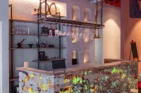 Zhaosu Shanzhichuanxingma Themed Vacation Apartment - bar